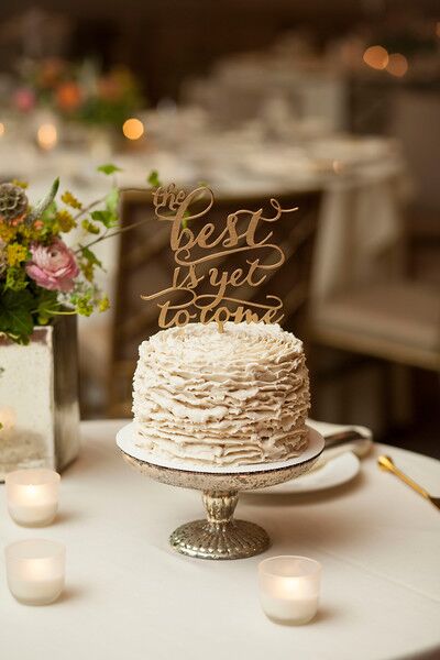 A simple, single-tier cake was created by B Free Bakery.