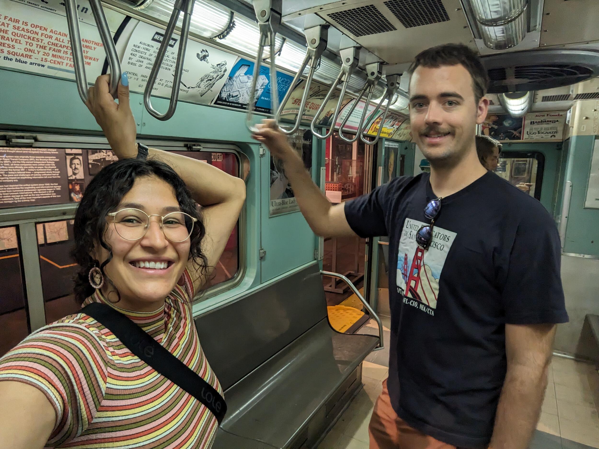 Just a couple of transit nerds at the subway museum in Brooklyn.
Solo un par de fanáticos del transporte público en el museo del metro de Brooklyn.