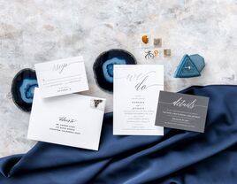 Minimalist foil wedding invitation suite ready to be mailed