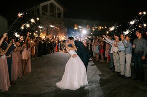 Couple Kissing During Sparkler Exit at Canyonwood Ridge in Dripping Springs, Texas