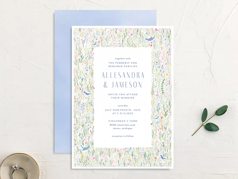 A lovely springtime floral wedding invitation.