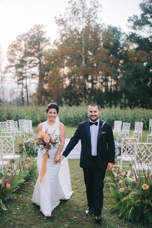 Bride and Groom Posing in Ceremony Aisle at Farm in Chadbourn, North Carolina