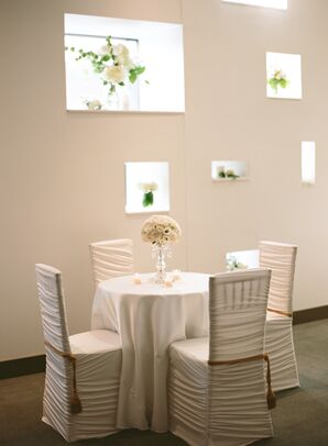 Chiavari Chairs with White Draping and Gold Tassels