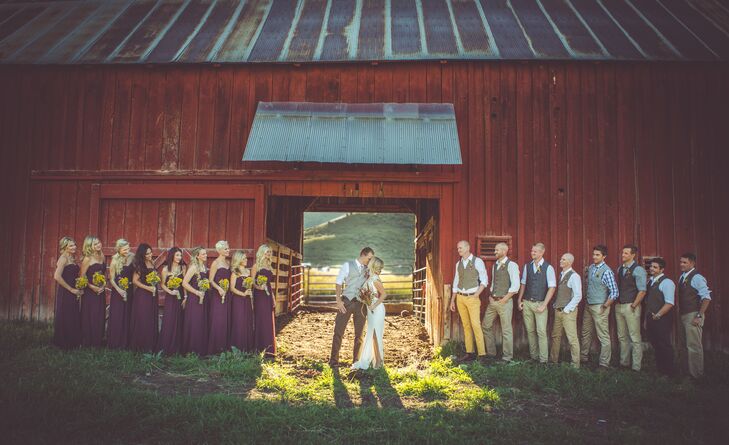 The groomsmen wore their own khaki pants and brown vests for the Colorado wedding. Although the groomsmen's attire was fairly casual, the bridesmaids contrasted the look with strapless, floor-length deep burgundy dresses. We love how the attire worked together to create a glamorous touch to the otherwise country fete.