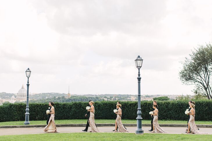 To complement the wedding’s white and gold palette and glamorous theme, Silje had her three maids of honor and three bridesmaids don floor-length sequin gowns in a luxe gold hue. “I loved the open back on the dresses, and in the front, we made some adjustments to make the dresses unique for our wedding," Silje says. "I wanted the girls to feel pretty and fabulous on the wedding day, like they deserve.”