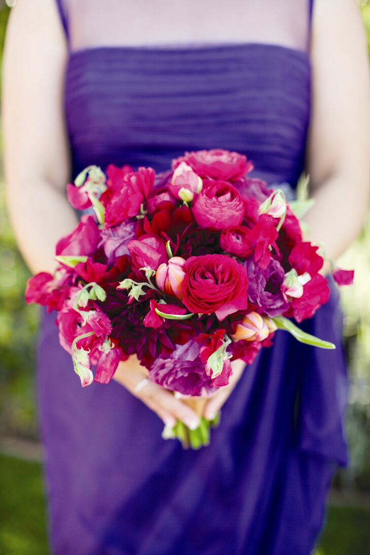 Each bridesmaid carried a jewel-tone bouquet that complemented her dress. A variety of blooms made up the bouquets, including roses, tulips, sweet peas and dahlias.