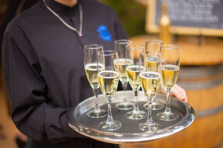 Champagne was passed after Roberto and Patrick exchanged vows at Chateau St. Jean Winery in Kenwood, California.