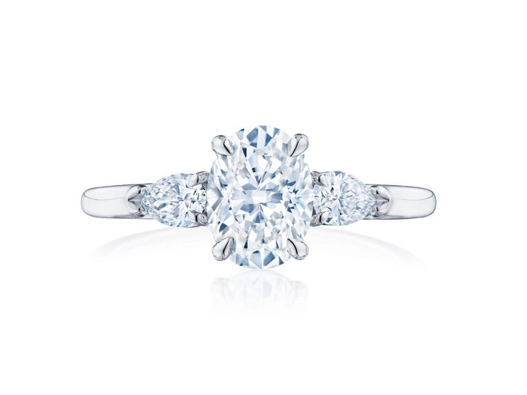 three-stone oval engagement ring with side stones