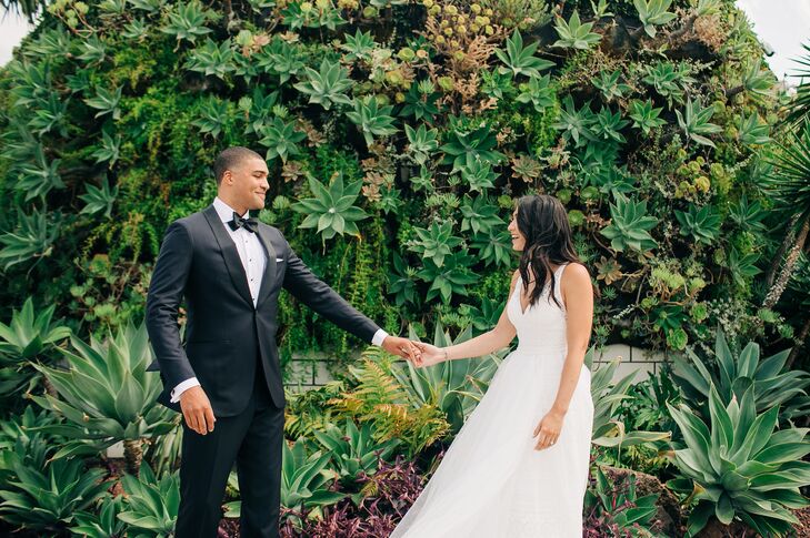 Classic Couple with Black Tuxedo and Elegant Wedding Gown