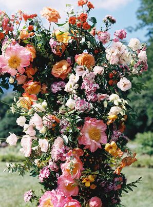 Tall and Colorful Floral Structure With Pink, Purple, Yellow and Coral