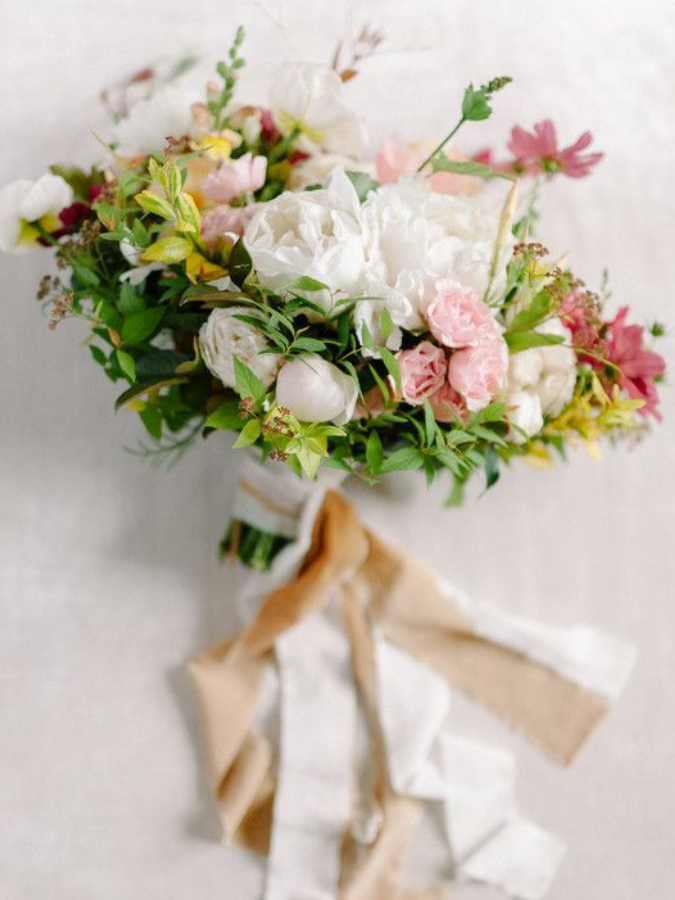 colorful garden-inspired bouquet with ribbon