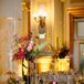 Reception Table With Silver Linen, Low and Tall Centerpieces With Red, Purple and Pink Flowers