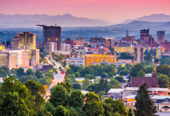 Aerial photo of downtown Asheville at sunset