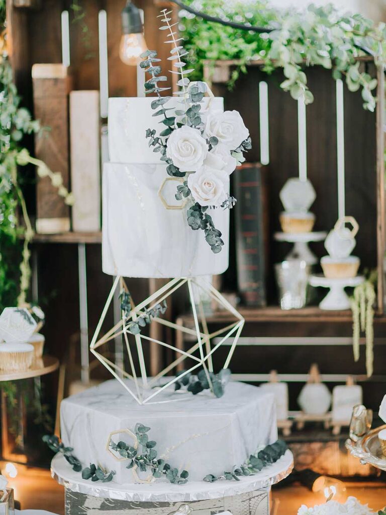 Marble wedding cake with geometric cake stand
