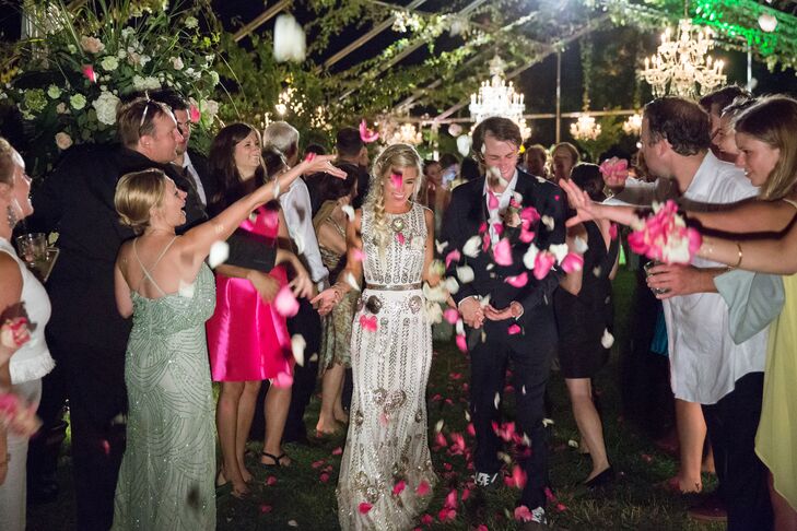 "We did not have a planned or formal exit, but the guests made a tunnel that we walked through while they threw flower petals in the air at the end of the night," Lauren says.