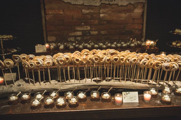 "A dessert bar was set up during inside the space, where cocktail hour had taken place," Corinne says. "Desserts included apple pies on a stick, reinvented s'mores, passion fruit cupcakes and triple chocolate mousse trifles."