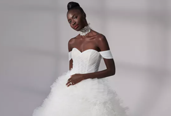 Off-the-shoulder ballgown with layers of pleated tulle skirt