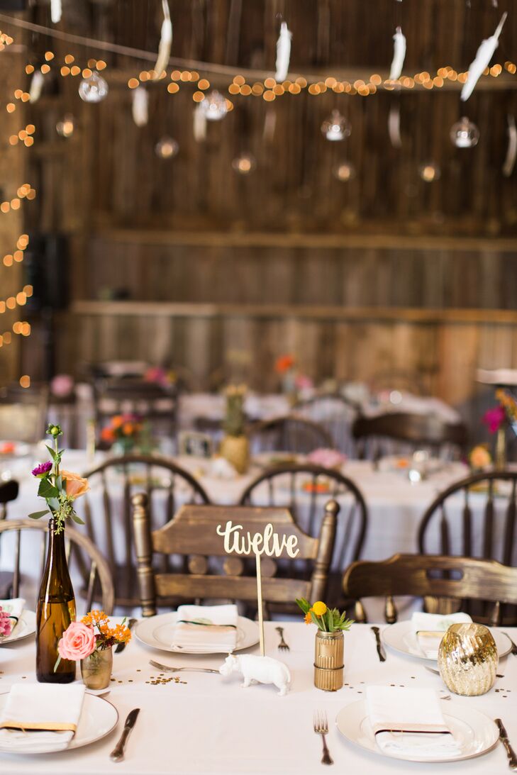Molly’s florist displayed arrangements of hydrangeas, roses and succulents in various metallic and vintage vases, resulting in simple centerpieces. “The flowers were, without a doubt, one of my favorite elements,” Molly says.