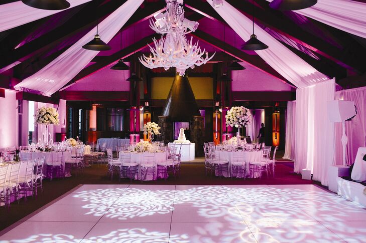 The custom white antler chandelier was the focal point of the reception decor.