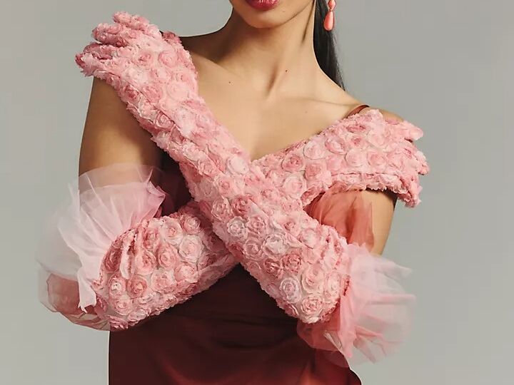 Pink floral elbow-length gloves with mesh tufts at the ends from Anthropologie