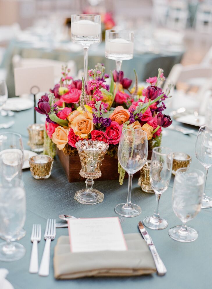 Small round bursts of colorful flowers were bundled as the table's centerpieces.