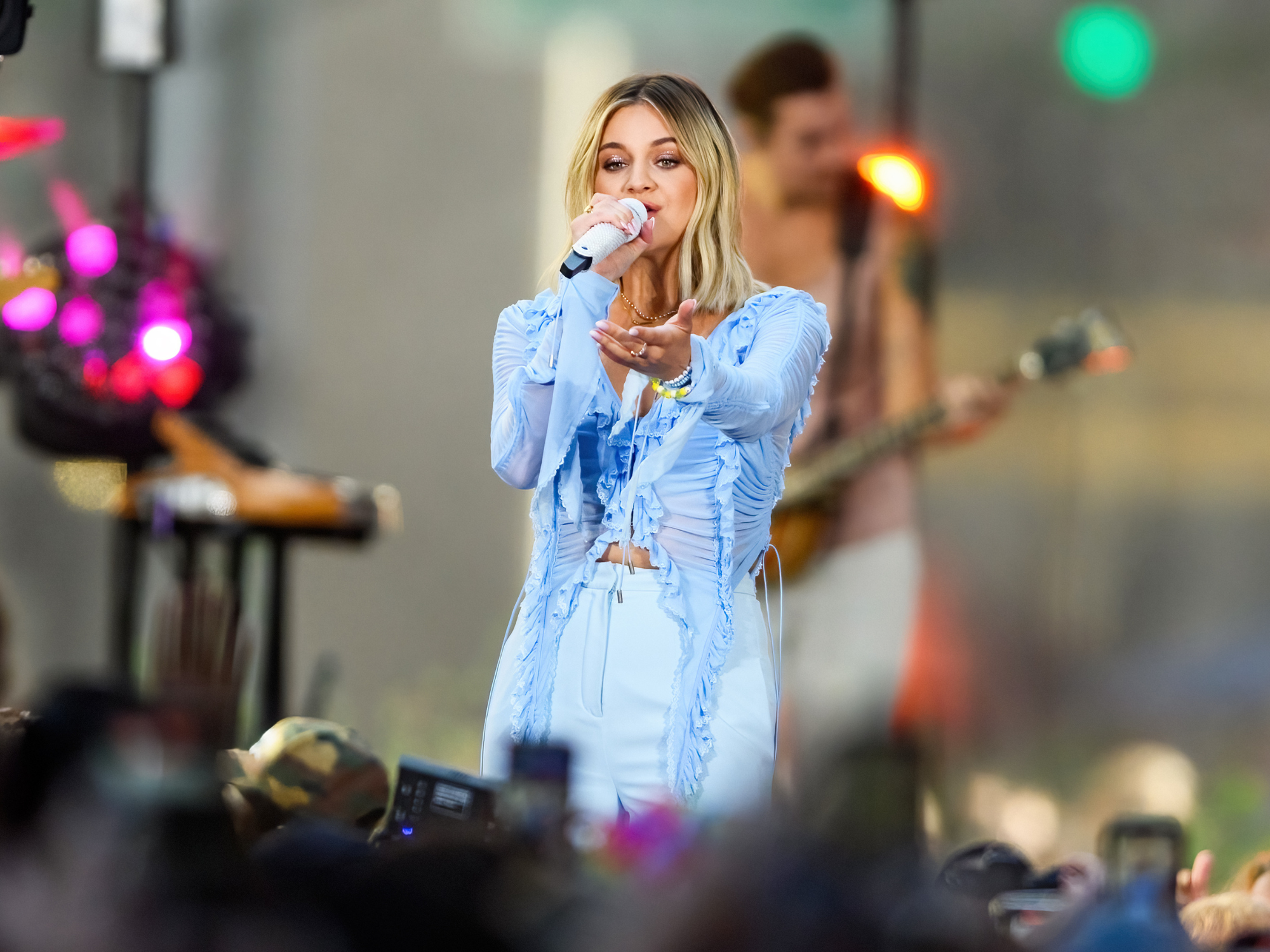 Kelsea Ballerini performing on stage