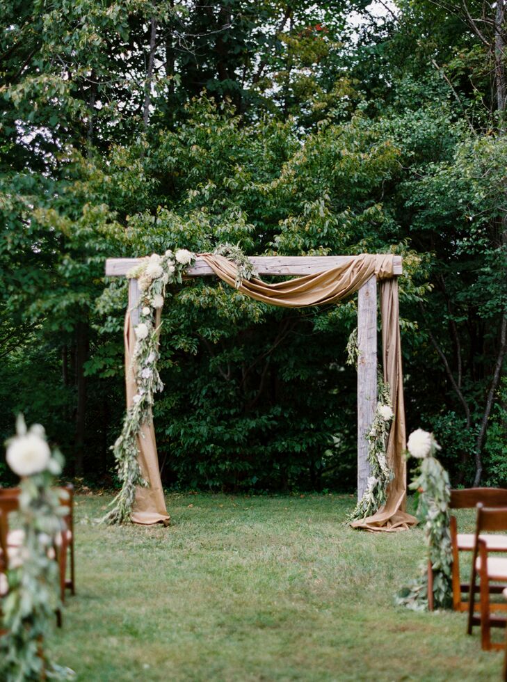 Christine and Adam let the landscape take center stage for the ceremony, incorporating elements that played up the setting’s woodland vibe. The aisles were lined with lush garlands of eucalyptus and a wooden arch draped in copper cloth, and an eye-catching arrangement of greenery and ivory florals framed the couple as they said their “I dos.” The pair customized the ceremony with readings from Rumi, Thoreau and Pablo Neruda, as well as instrumentals of their favorite tunes. “We wanted our ceremony to speak more to our journey together and the roles that our friends and family played in it,” Christine says. “Addison and I met almost exactly 10 years before the wedding—freshman year at UVM—so our wedding felt like this climactic moment that everyone present was a part of, and we were excited to honor that during the ceremony.”