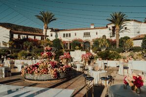 Outdoor Luxurious Courtyard Space, Flowers Spilling Pink From Fountain, Cocktail Tables