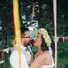 Namia wore a yellow and white daisy and baby's breath flower crown to tie in the boho, woodland wedding theme.