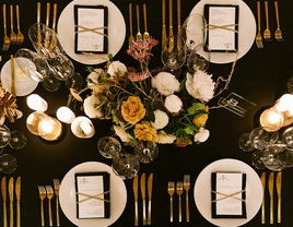 Aerial view of wedding tablescape at a reception.