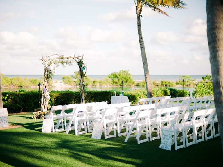 chairs on a lawn set up for wedding ceremony in florida
