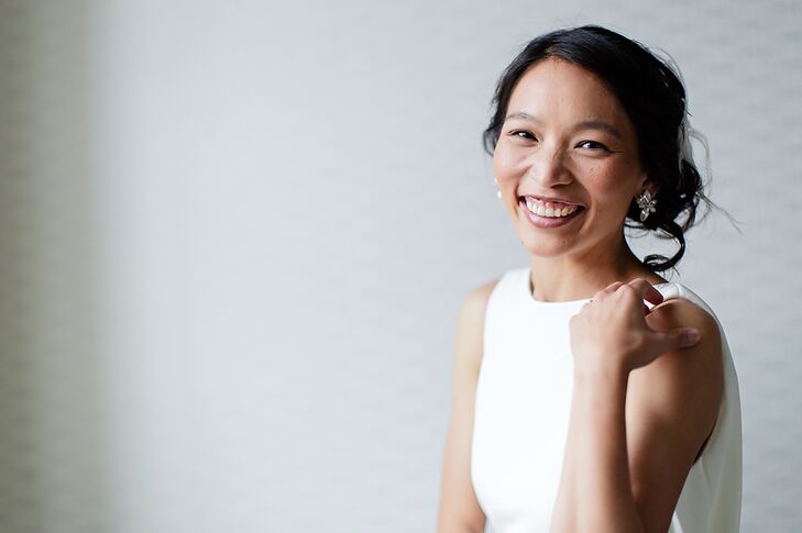 Smiling Bride with White Backdrop