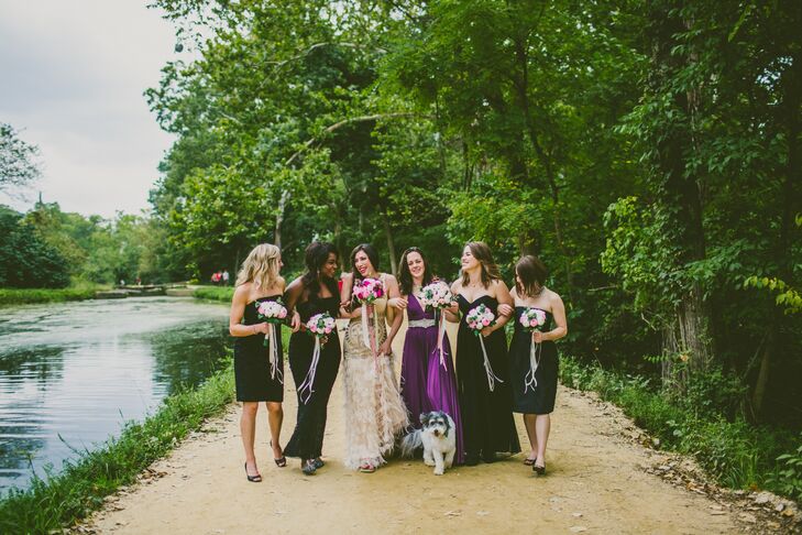 “We didn't want our bridesmaids dresses to compete with our colors, so we decided they should all wear black,” Kimberly says.