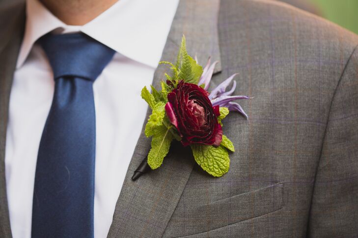 Bernard's wedding day attire was accentuated by his deep purple boutonniere. Instead of having a wedding party, it was just Tess, Bernard and the bride's sister, who officiated the ceremony.