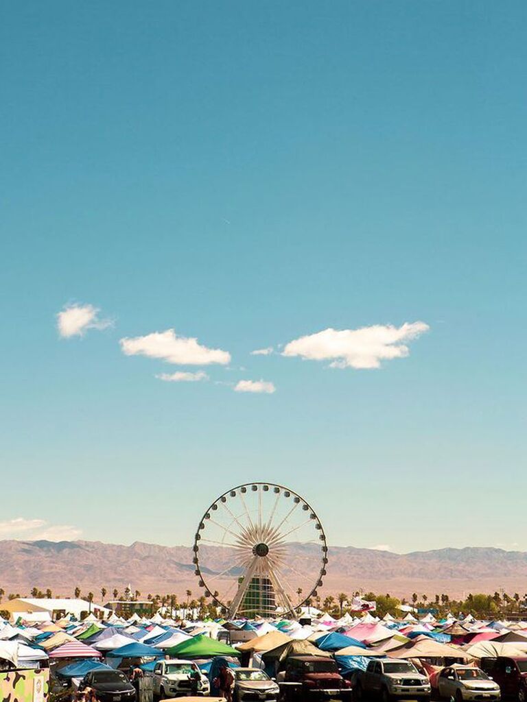 View of Coachella ferris wheel and tents at Coachella Festival