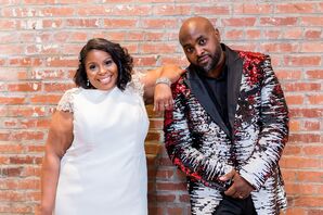 African-American Couple in White Dress and Metallic Suit Jacket