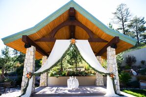 Rustic Wood and Stone Wedding Arbor