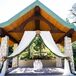 Rustic Wood and Stone Wedding Arbor