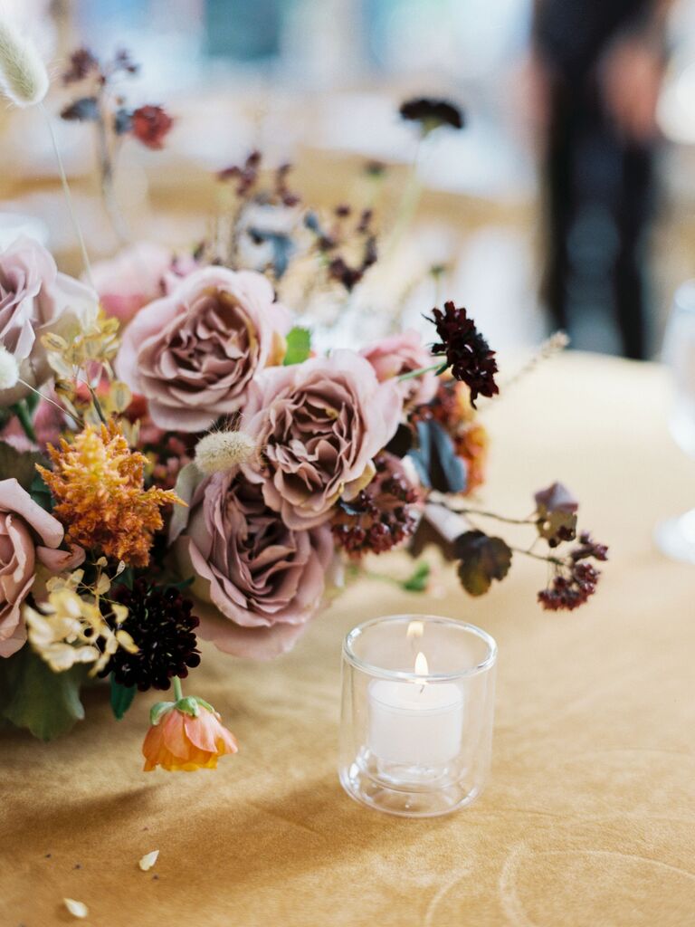 mauve fall wedding centerpiece with votive candle