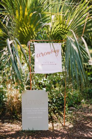 Ceremony Sign Hanging from a Gold Frame