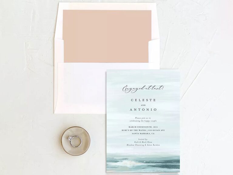 Engagement party invitation with a painting of ocean