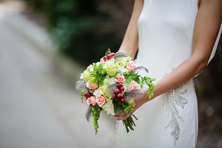 The bride designed her own bouquet, which was made of white hydrangeas, green roses and maidenhair fern.