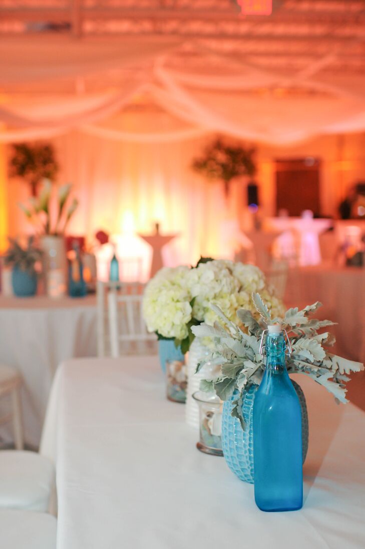 Dusty Miller and Hydrangea Centerpieces in Colorful Vases