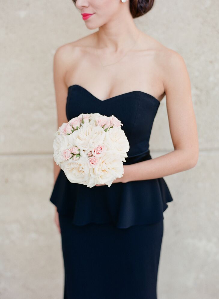 The bridesmaids carried white garden roses accented with smaller blush roses. Lynn really wanted each lady to carry a small, simple bouquet that they wouldn’t hate holding for the entire ceremony, and her florist totally got it.