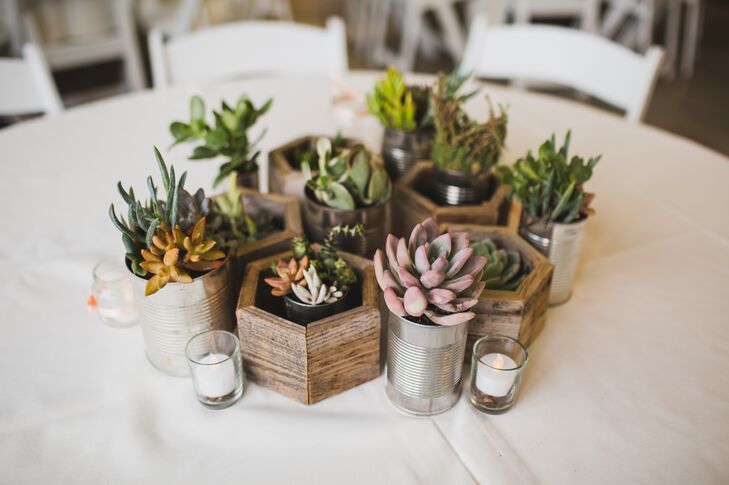 Elisa’s stepfather, Rick, helped with all the wooden accents in the DIY centerpieces, including wooden hexagons, planter boxes and chopped-wood slices for the succulents.