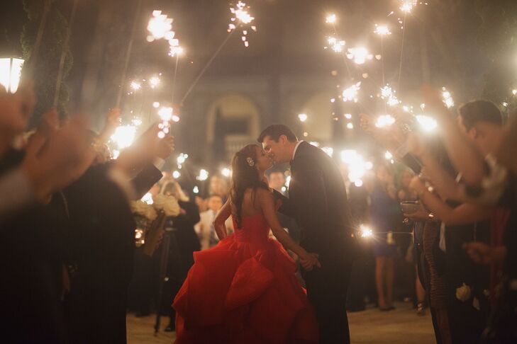 Amina and Brian were surrounded by their 170 friends and family members as they left the reception in a festive sparkler exit.