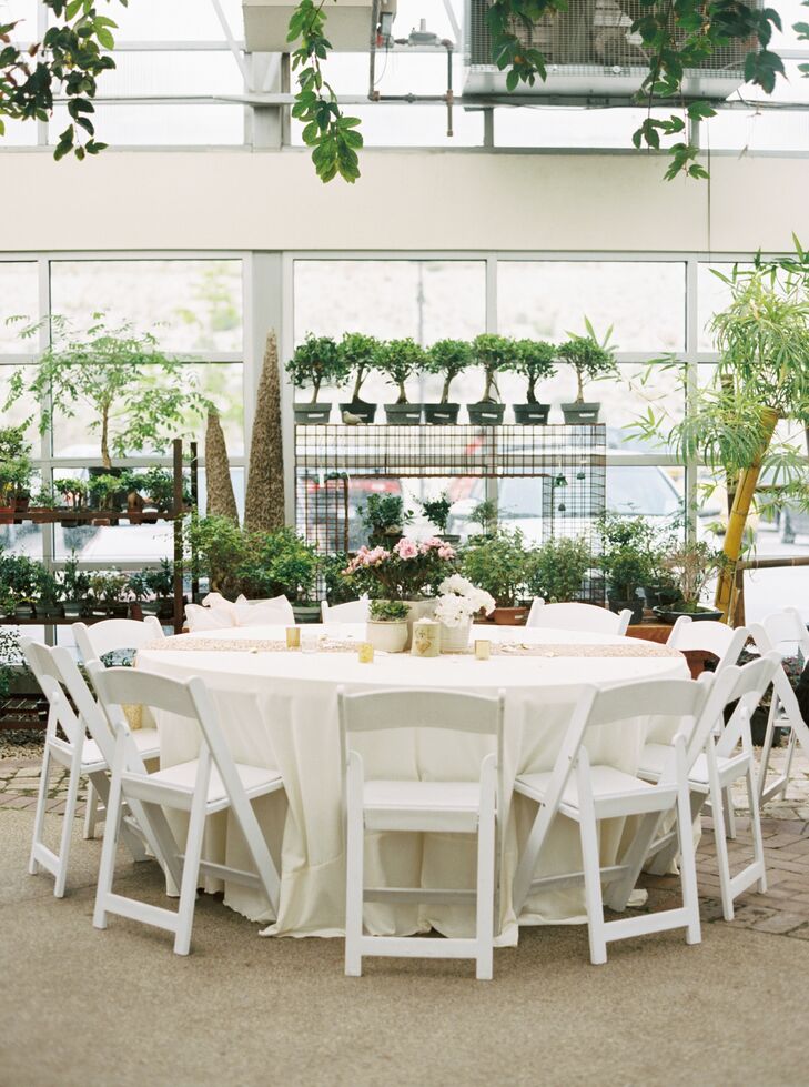 Cactus and Tropicals was already so beautiful and lush, Lauren and Kyle barely had to decorate. Their dining tables had neutral linens and table runners with soft gold accents and potted blush and white flowers to tie in the natural scenery.