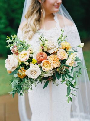 Bride With Bouquet of Zinnias, Ranunculus, Roses, Yarrow, Oranges and Grapefruit