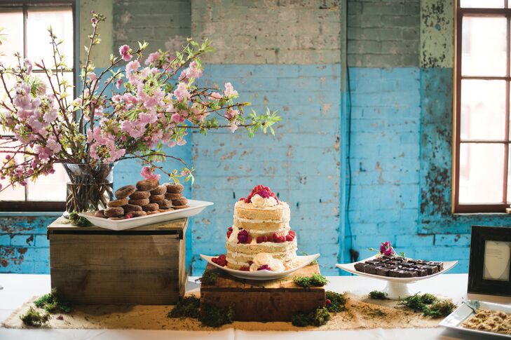 While 111 Maine’s menu of everything from mini lobster rolls to fish tacos with blueberry-mango slaw went over big with the couple’s guests, the cake received rave reviews. “I love coconut and the look of naked cakes, so those were my only requests,” says Lauren. The couple’s catering team delivered with a decadent coconut-raspberry confection, plus an assortment of miniature desserts including strawberry rhubarb tartlets.