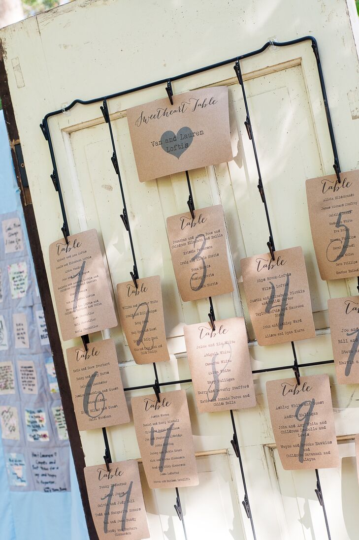 These vintage-inspired escort cards were hung on an old door.